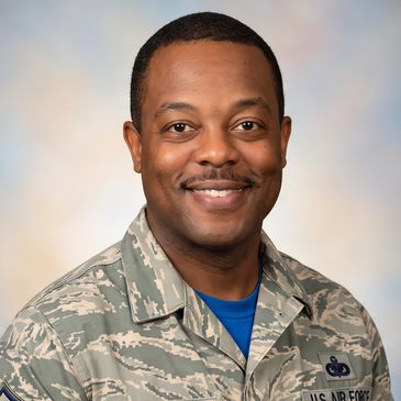 Smiling man in U.S. Air Force uniform.