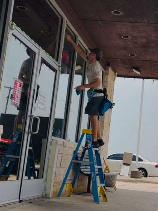 Window cleaning business store front.