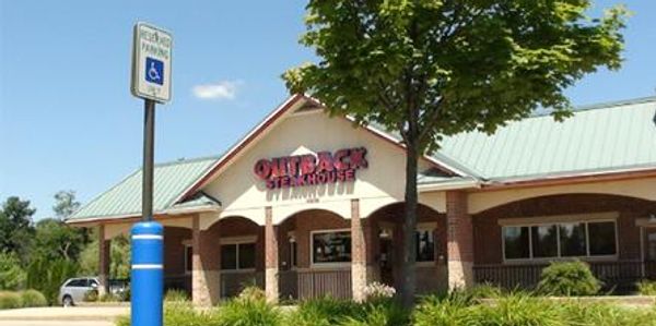 Blue Post Guard bollard cover with handicap sign