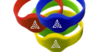 Three colorful silicone rings with a white triangular logo.