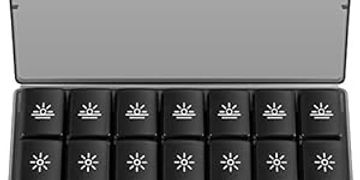 A weekly pill organizer with sun and moon icons for day and night doses.