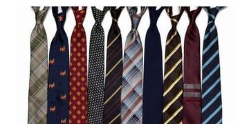 A collection of ten assorted patterned neckties arranged in a row.
