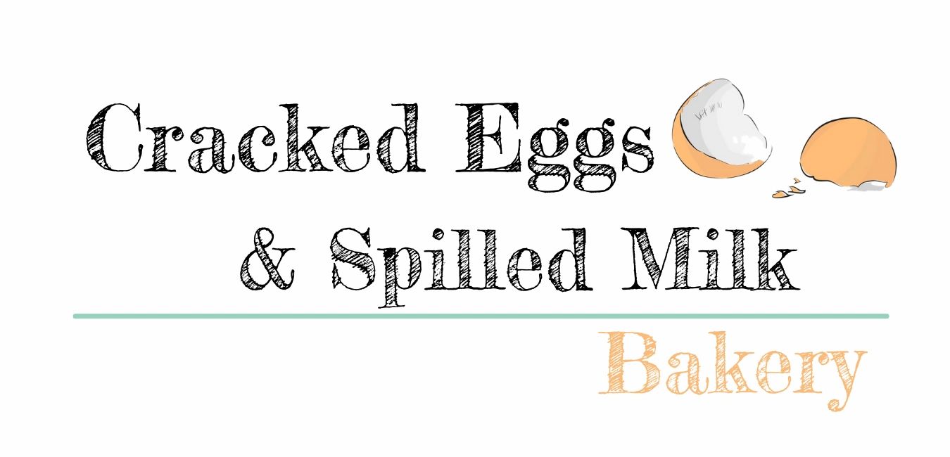 logo for cracked eggs and spilled milk bakery, black and yellow wording with a cracked egg image