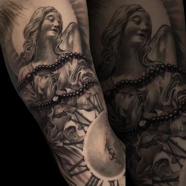 Black and gray tattoo of an angel with a rosary and clock.
