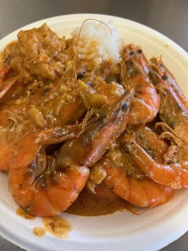 A Plate Of Unshelled Prawns