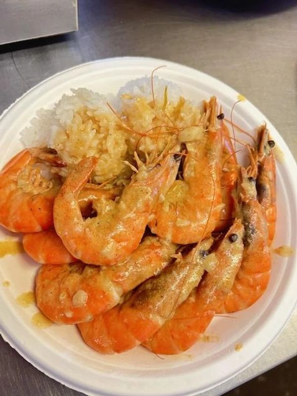 A Plate Of Unshelled Prawns