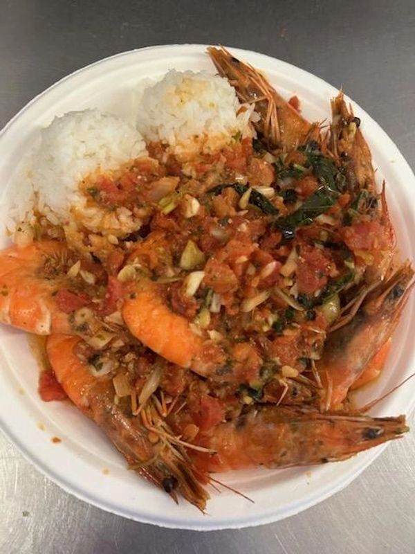 A Plate Of Unshelled Prawns And Rice