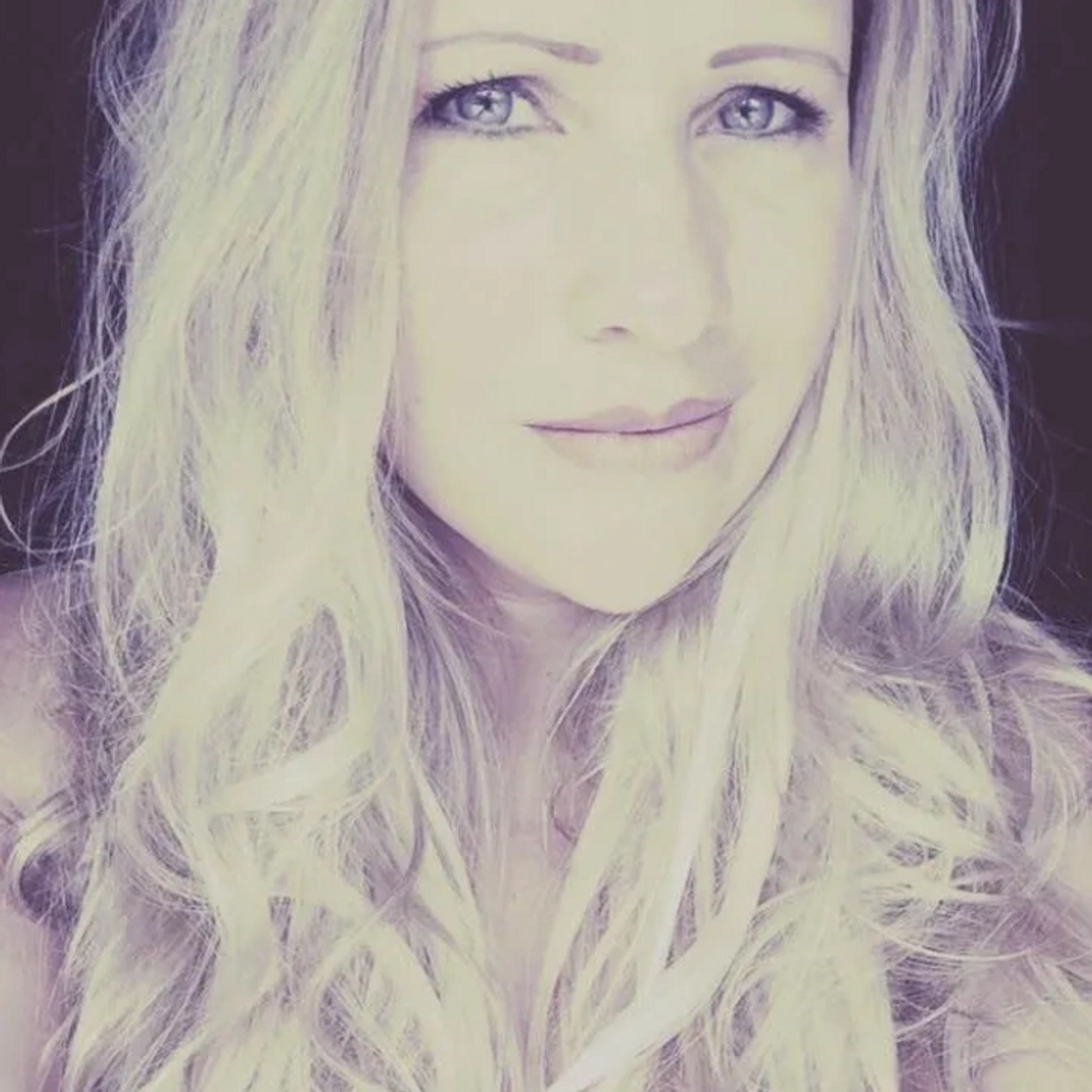 woman appear on camera with her hair down