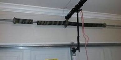 Broken garage door springs on a garage door