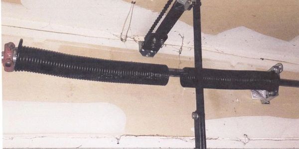 broken garage door spring.
Garage doors repairs & installations. 
GDR Installations Forney Tx