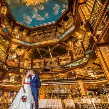 Bride and groom kissing aboard Majesty