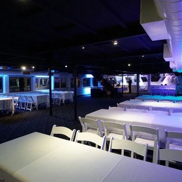 Tables set up with white tableclothes