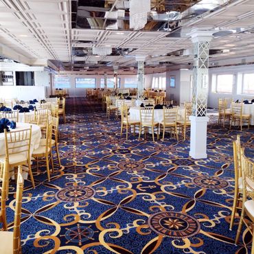 Dining room aboard yacht, tables and chairs
