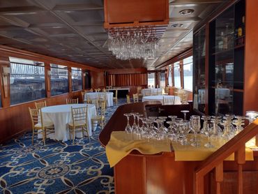 Sundancer interior, lower level, tables and bar