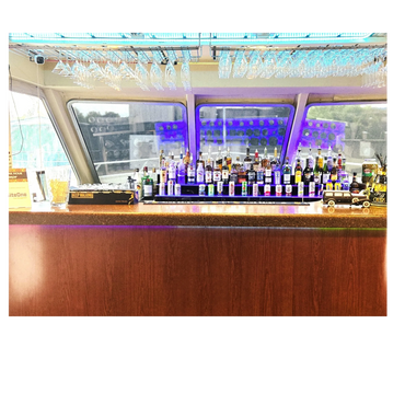 View of bar with many liquor bottles