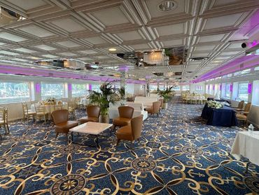 Interior of Horizon's Edge Salon deck, carpets, chairs, couches and coffee tables