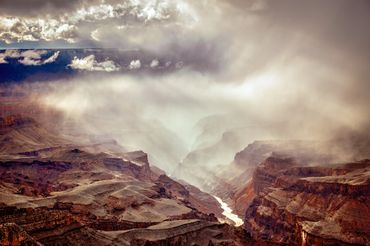 Mist floats over the Grand Canyon