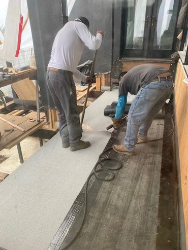 restoration, deck and porch re-construction, hot mop, and waterproofing deck.