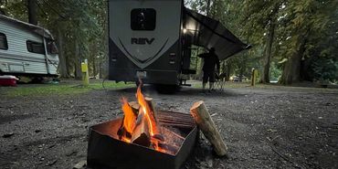 Customer rented a motorhome and camping with a wood fire.