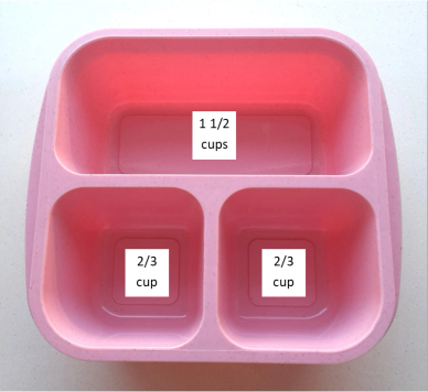 Pink silicone mold with volume measurements for baking.