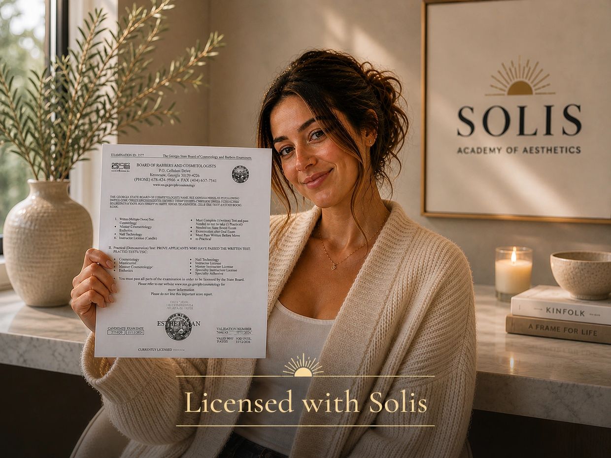 Woman proudly holding an esthetician license from Solis Academy of Aesthetics.