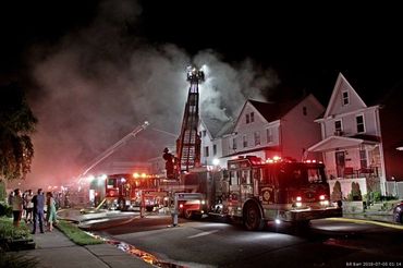 A double house fire in the Heights section in the evening on the 4th of July.