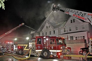 A double house fire in the Heights section in the evening on the 4th of July.