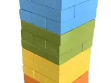 Stacked colorful wooden blocks in a tower shape.