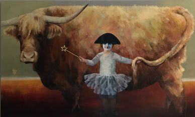 A child in a tutu and hat stands beside a large cow, holding a star wand.