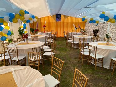 elegant event lighting, ceiling draping, sophisticated ambience, luxury wedding designs