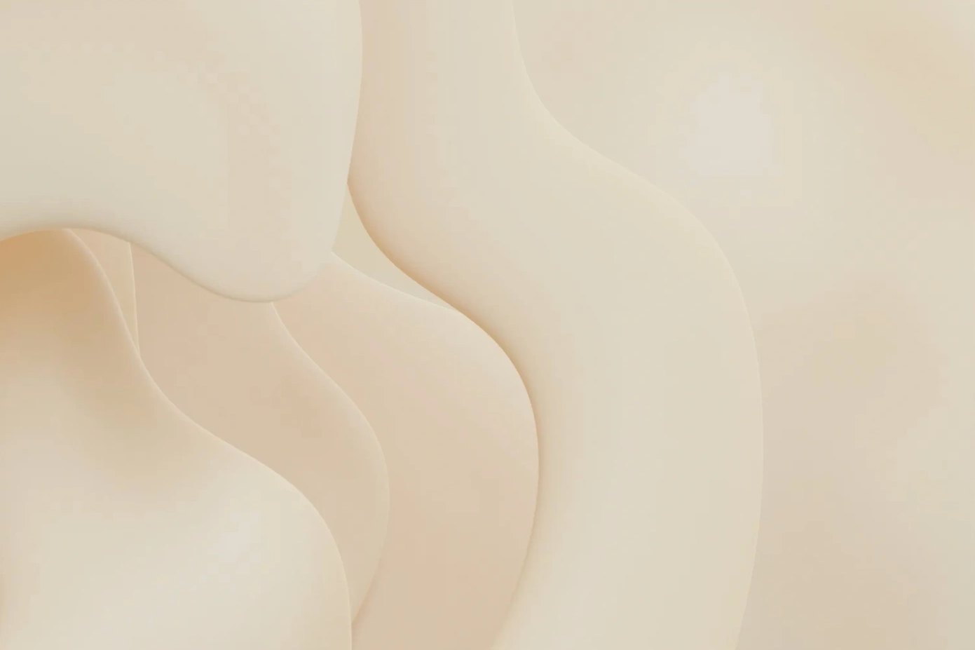 Abstract smooth beige shapes forming a soft flowing pattern.