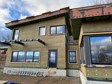 Exterior Rock Wool Insulation Install.