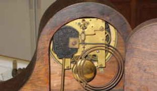 mechanism in an antique mantle clock