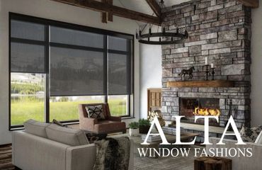 Cozy living room with stone fireplace and modern window blinds.