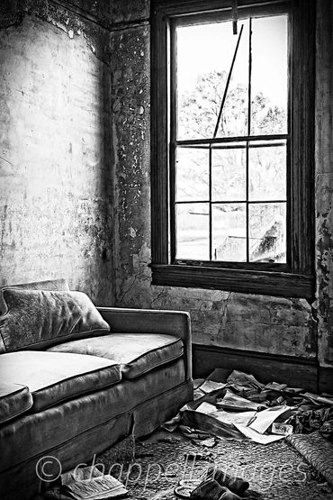 cold light illuminates shabby, deserted room Slippers ad a book on dirt floor . Mom on note appears