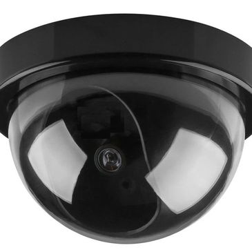 Black dome security camera with a reflective dome cover.
