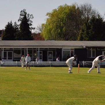 Cricket match in progress at Epsom Sports Club, Woodcote Road