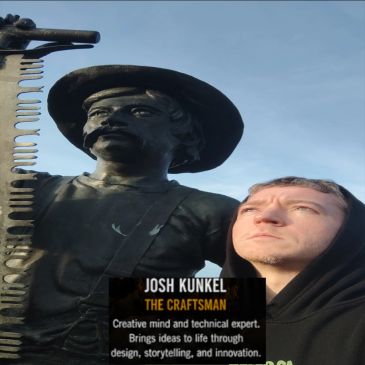 Man posing next to a statue with an inspirational quote about craftsman skills.