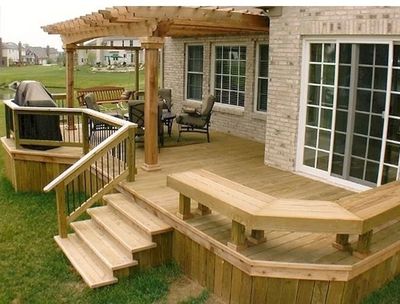 Back deck with bench, rail, and pergola