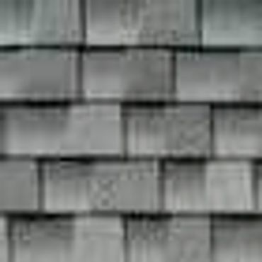 closeup shot of a gray house roofing