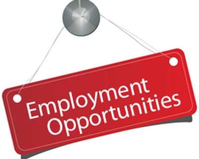 Red signboard reading Employment Opportunities pinned on a wall.