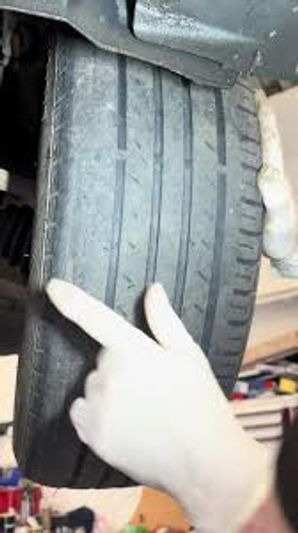 Front wheels and suspension being inspected for proper wheel alignment in Moncton NB