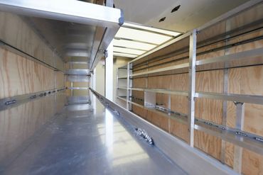 Long-run shelves for pipe storage.