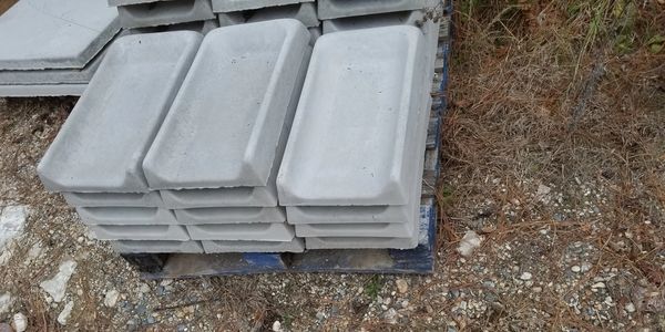 concrete splash blocks, down spouts