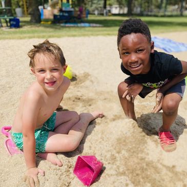 kids playing in the clean sandy beach