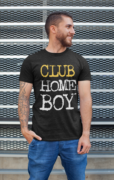 Smiling man wearing a black T-shirt with 'CLUB HOME BOY' text and blue jeans.