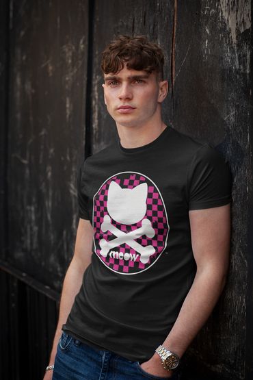 Young man wearing a black t-shirt with a cat and crossbones design.