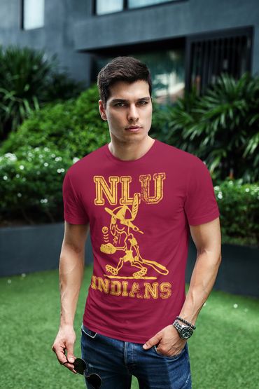 Man wearing a red NLU Indians T-shirt outdoors.