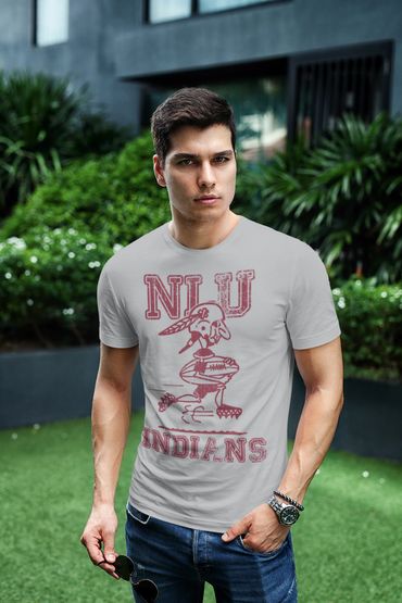 Man wearing a grey NIU Indians t-shirt outdoors.
