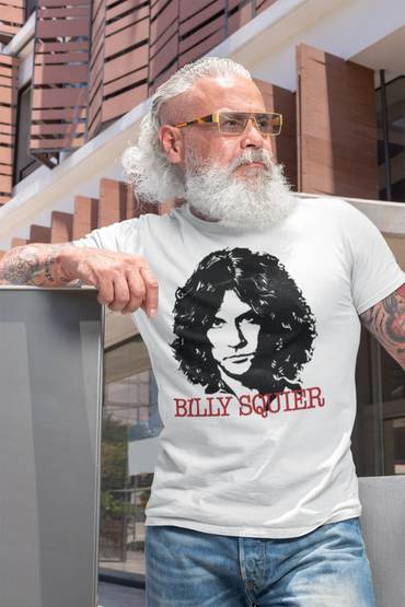 Older man with white beard wearing a Billy Squier t-shirt and sunglasses outdoors.